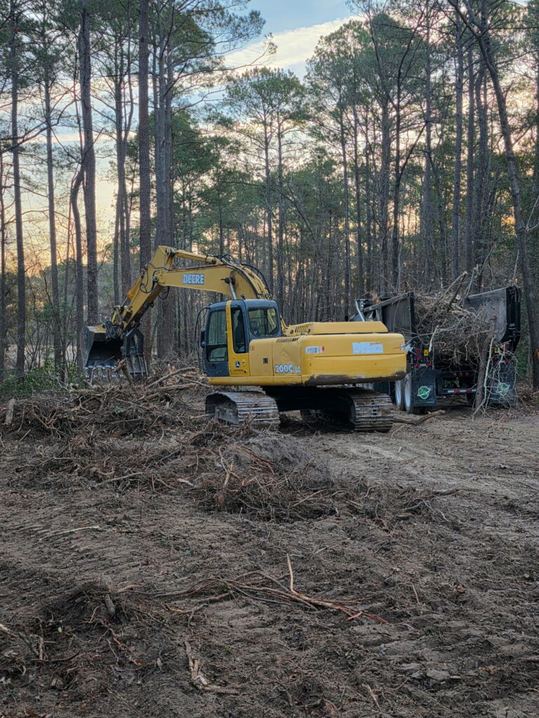 Heavy equipment working on and site preparation.